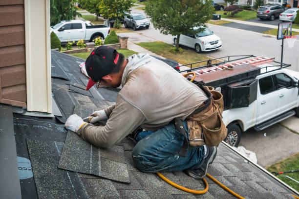 Professional Storm Damage Roof Repair technician working in Marietta, MS